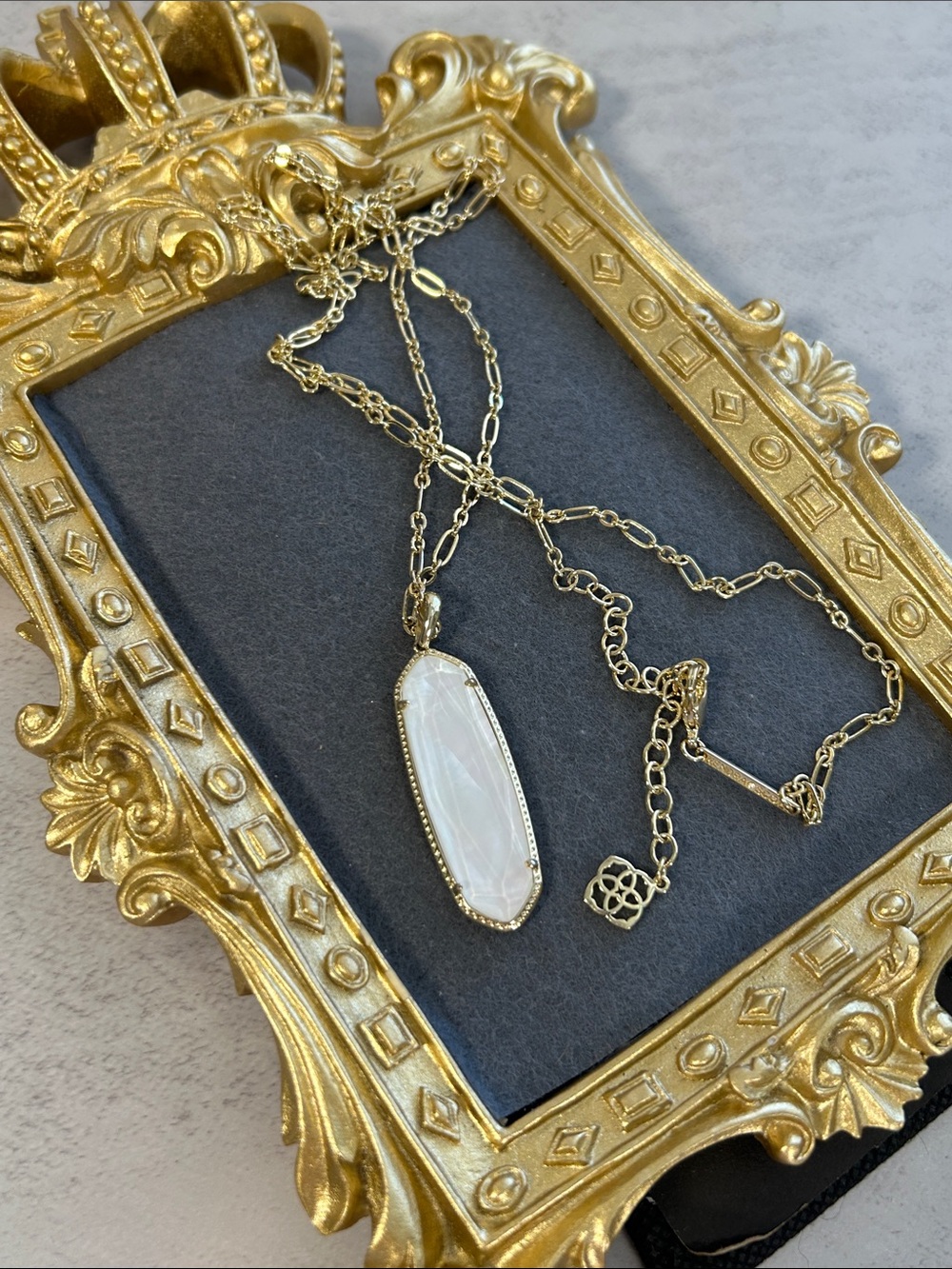 Kendra Scott Gold Necklace with White Mother-of-Pearl Oval Pendant